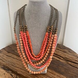 Coral beaded statement necklace.